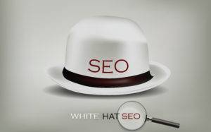 White bowler hat with the word SEO imposed across it